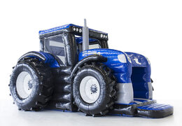 Gepersonaliseerde new holland tractor springkastelen laten maken bij JB Promotions Nederland. Promotionele springkastelen in alle soorten en maten razendsnel op maat gemaakt