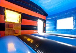 Overdekt maxi multifun springkussen in thema auto met een glijbaan kopen voor kinderen. Bestel springkussens online bij JB Inflatables Nederland