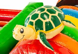 Springkussen in thema tropisch met een glijbaan kopen voor kinderen. Bestel opblaasbare springkussens online bij JB Inflatables Nederland