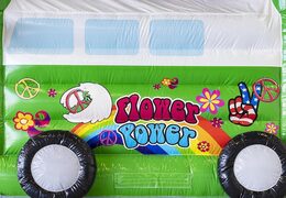 Opblaasbaar springkussen standaard met dak in hippy thema groen bestellen voor kinderen