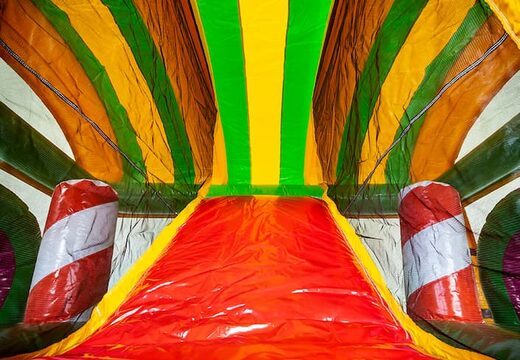 Multiplay XXL Jungleworld springkasteel in een uniek design met twee ingangen, een glijbaan in het midden en 3D objecten bestellen voor kinderen. Koop springkastelen online bij JB Inflatables Nederland