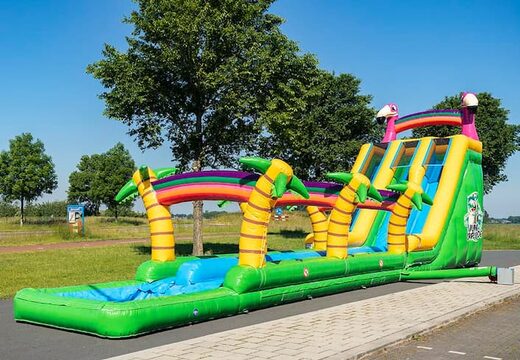 Koop Drop & Slide Jungle Springkussen met dubbele glijbaan voor kinderen. Bestel springkussens online bij JB Inflatables Nederland