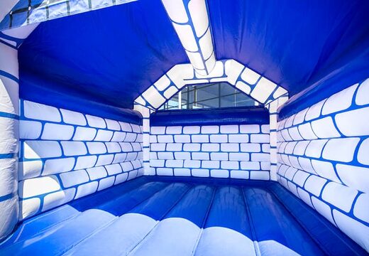 Koop standaard blauw kasteel springkussen met een ridder thema voor kinderen. Koop springkussens online bij JB Inflatables Nederland