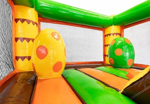 Klein opblaasbare springkasteel met glijbaan in thema dinosaurus te koop voor kinderen. Bestel opblaasbare springkastelen bij JB Inflatables Nederland