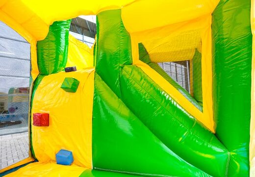 Multiplay Happy jungle springkussen met een glijbaan bestellen voor kinderen. Koop opblaasbare springkussens online bij JB Inflatables Nederland