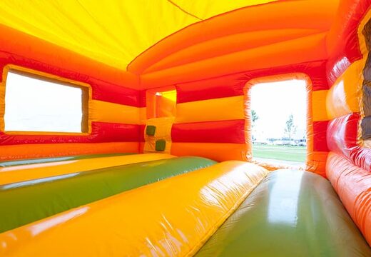 Koop maxi multiplay springkasteel in thema feest met een glijbaan voor kids bij JB Inflatables Nederland.  Bestel nu online springkastelen bij JB Inflatables Nederland