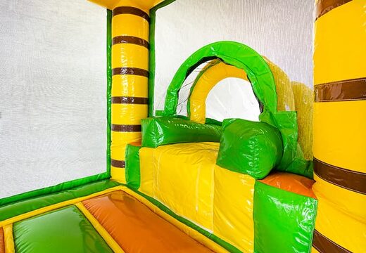 Koop mini opblaasbare multiplay springkussen in jungle thema met glijbaan voor kinderen. Bestel opblaasbare springkussens online bij JB Inflatables Nederland