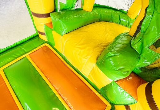 Mini opblaasbare multiplay springkasteel met glijbaan in jungle thema te bestellen voor kinderen. Bestel opblaasbare springkastelen online at JB Inflatables Nederland