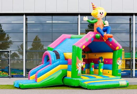 Overdekt multifun springkussen met glijbaan in thema feest met 3D object aan de bovenkant bestellen voor zowel jonge als oudere kinderen. Koop springkussens online bij JB Inflatables Nederland