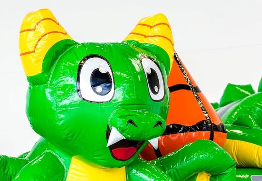 Springkussen in draak thema met glijbaan, leuke objecten op het springvlak en opvallende 3D objecten bestellen voor kinderen.  Koop opblaasbare springkussens online bij JB Inflatables Nederland
