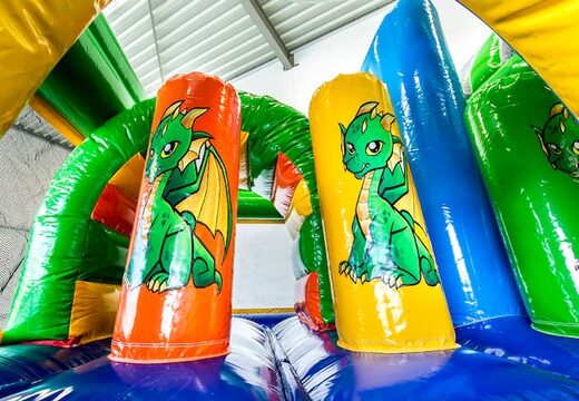 Koop middelmatig opblaasbare multiplay springkasteel in draak thema met glijbaan voor kinderen. Bestel opblaasbare springkastelen online bij JB Inflatables Nederland