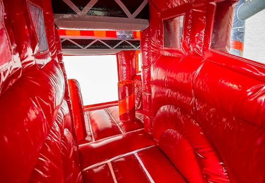 Klein overdekt opblaasbaar multiplay springkasteel met glijbaan bestellen in brandweer thema voor kinderen. Koop opblaasbare springkastelen online bij JB Inflatables Nederland