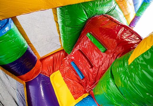 Bestel middelmatig opblaasbare multiplay springkasteel in superblocks thema met glijbaan voor kinderen. Koop opblaasbare springkastelen online bij JB Inflatables Nederland