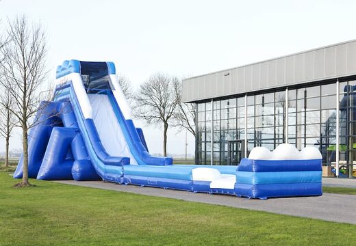 Monsterslide opblaasbaar 11meter hoog en 54 meter lang met een dubbele trap kopen. Bestel opblaasbare glijbanen nu online bij JB Inflatables Nederland