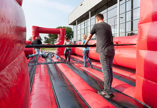 Zwart rode opblaasbare tafelvoetbal met uniek boardingschuifsysteem te koop